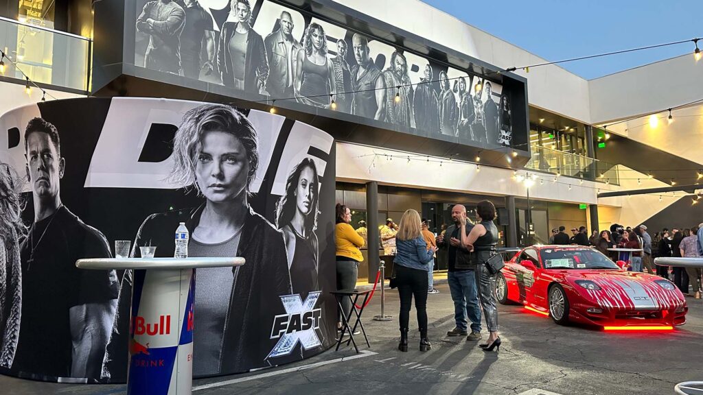 Coachella Party 360 photo booth with custom backdrop at FastX Soundtrack release in Los Angeles, featuring Charles Theron and all the FastX cast