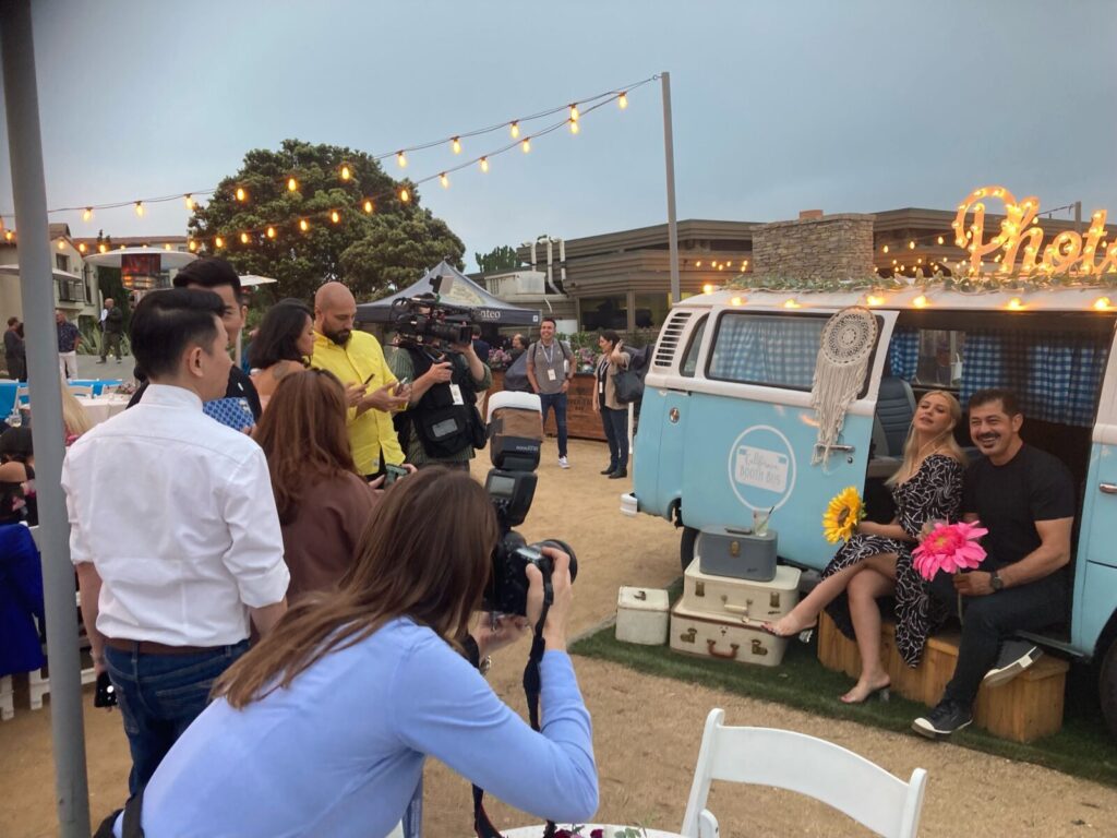 Guests at the Herbalife Event sit in the VW Bus